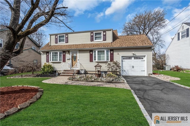 2124 Orchard Dr, South Plainfield, NJ 07080 - view of front facade featuring driveway, roof with shingles, a garage, cooling unit, and a front lawn