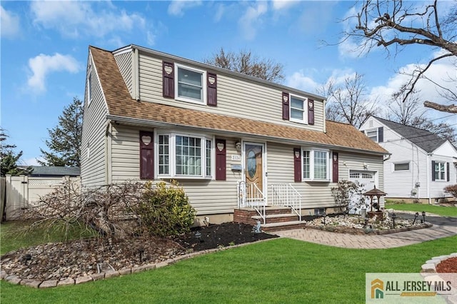 2124 Orchard Dr, South Plainfield, NJ 07080 - view of front of house with fence, a shingled roof, entry steps, and a front yard