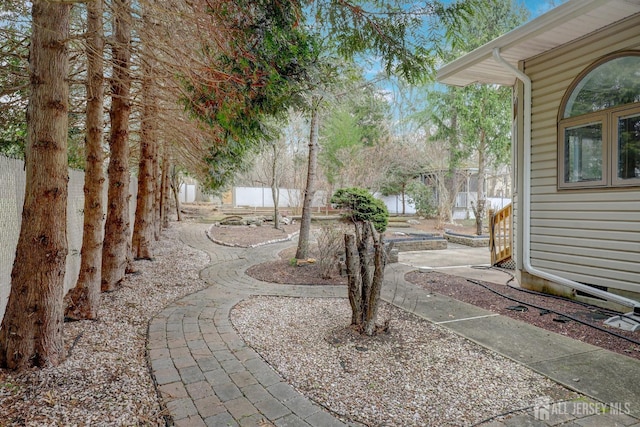 view of yard featuring fence