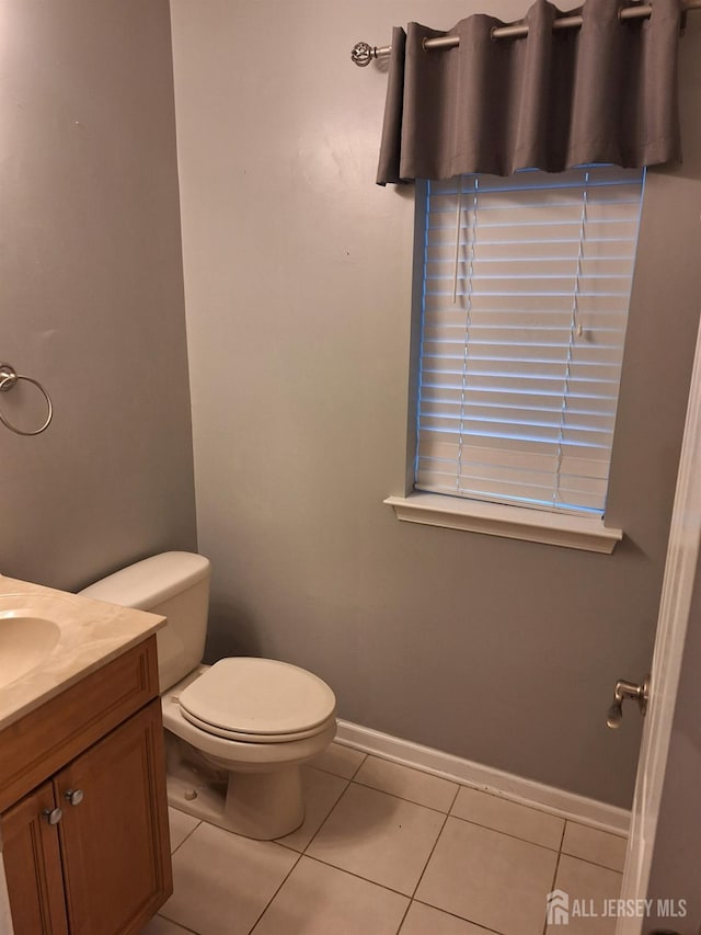 1057 Morning Glory Dr, Monroe, NJ 08831 - bathroom featuring vanity, tile patterned flooring, toilet, and baseboards