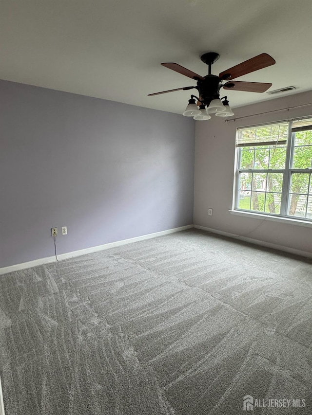 1057 Morning Glory Dr, Monroe, NJ 08831 - unfurnished room featuring carpet flooring, a ceiling fan, and baseboards