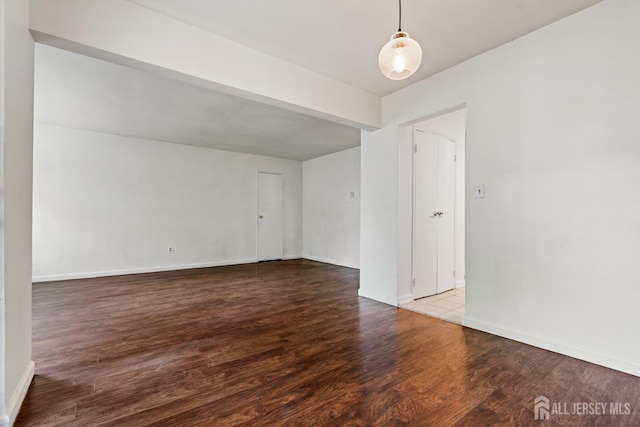 18 Lake Ave Unit 8A, East Brunswick, NJ 08816 - spare room with wood finished floors and baseboards