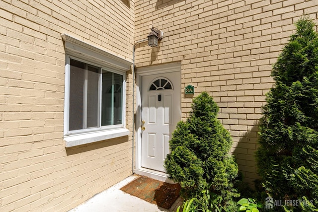 18 Lake Ave Unit 8A, East Brunswick, NJ 08816 - entrance to property featuring brick siding