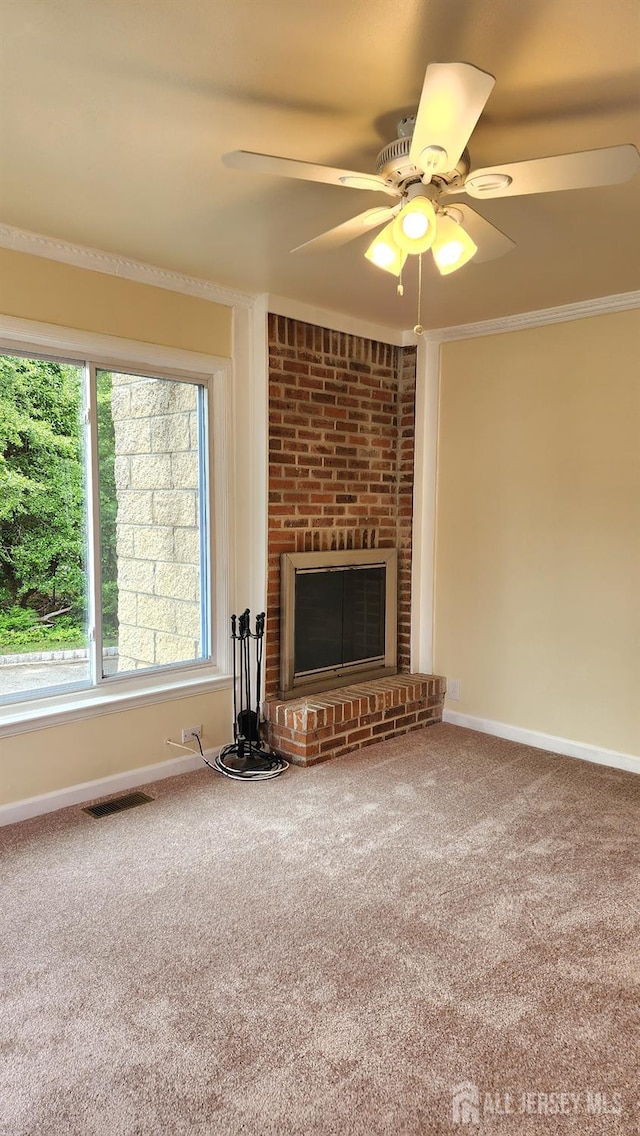 20 Brunswick Ave, Spotswood, NJ 08884 - unfurnished living room with carpet floors, a brick fireplace, ceiling fan, and crown molding