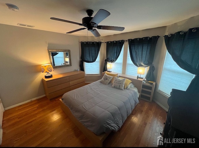 54 Washington Rd, Sayreville, NJ 08872 - bedroom with wood finished floors, baseboards, and a ceiling fan