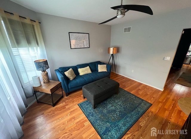 54 Washington Rd, Sayreville, NJ 08872 - living area featuring ceiling fan, light wood-style flooring, and baseboards