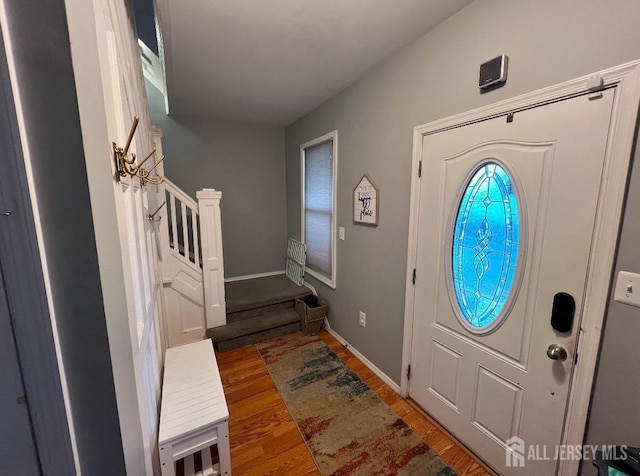 54 Washington Rd, Sayreville, NJ 08872 - foyer entrance with wood finished floors, stairs, and baseboards