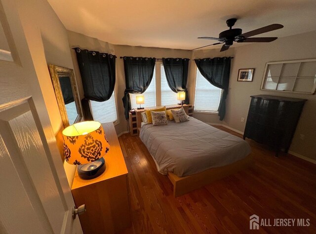 54 Washington Rd, Sayreville, NJ 08872 - bedroom with wood finished floors, baseboards, and a ceiling fan