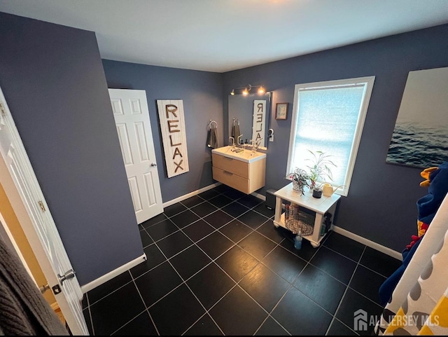 54 Washington Rd, Sayreville, NJ 08872 - bathroom with tile patterned flooring, baseboards, and vanity