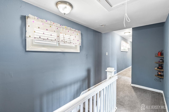 76 Woodland Dr, Keyport, NJ 07735 - hallway featuring carpet flooring, attic access, baseboards, and an upstairs landing
