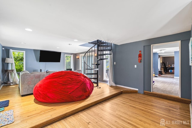 76 Woodland Dr, Keyport, NJ 07735 - living area featuring stairs, hardwood / wood-style flooring, and baseboards