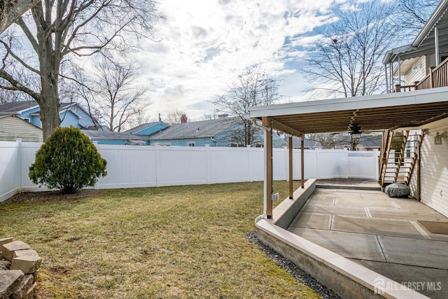 view of yard featuring a fenced backyard and a patio