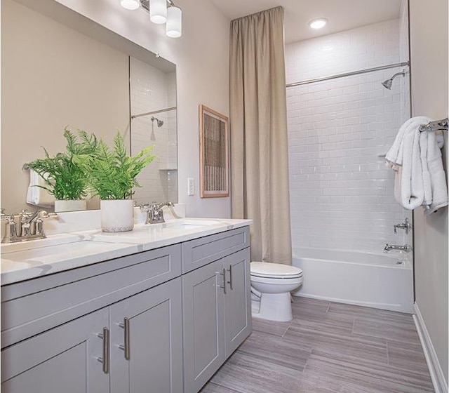 1313 Parker Blvd, West Windsor, NJ 08550 - bathroom with shower / bathtub combination with curtain, double vanity, toilet, and wood finished floors