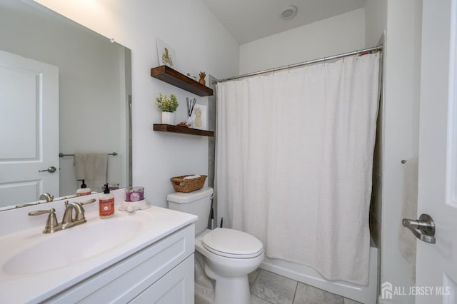 bathroom featuring shower / tub combo, toilet, and vanity