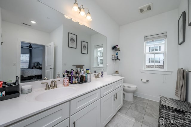 822 Stiller Ln, Monroe, NJ 08831 - full bath featuring ensuite bath, toilet, double vanity, and plenty of natural light