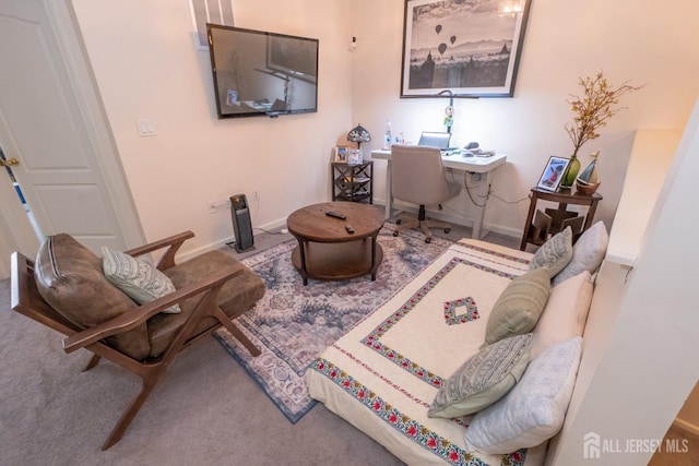 living room featuring baseboards