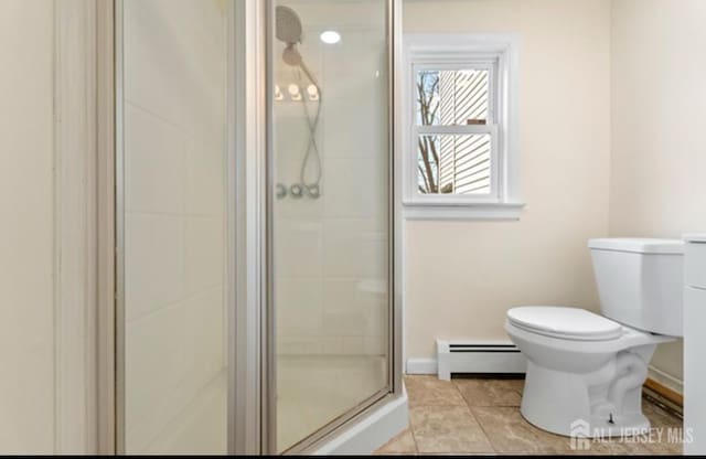 5 Warren St, Jamesburg, NJ 08831 - full bath with a baseboard radiator, a shower stall, and tile patterned flooring