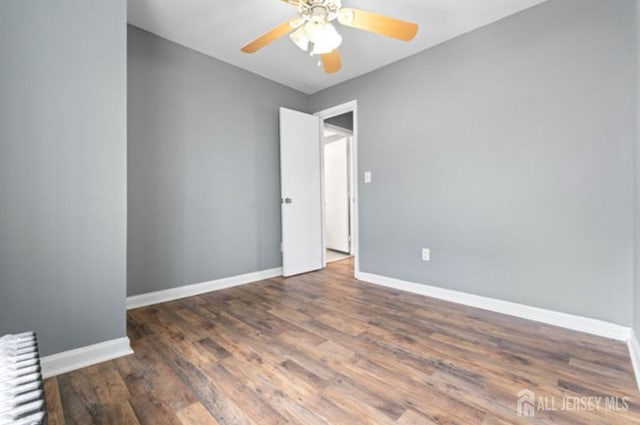 5 Warren St, Jamesburg, NJ 08831 - spare room featuring wood finished floors and a ceiling fan
