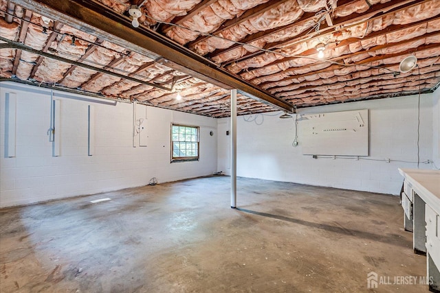 730 Old Post Rd, Edison, NJ 08817 - basement featuring concrete block wall and a garage