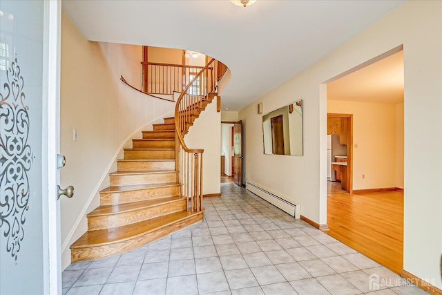 730 Old Post Rd, Edison, NJ 08817 - entrance foyer featuring a baseboard radiator, stairs, and light tile patterned flooring
