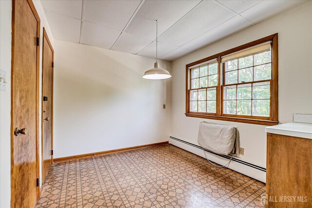 730 Old Post Rd, Edison, NJ 08817 - unfurnished dining area with baseboard heating and baseboards