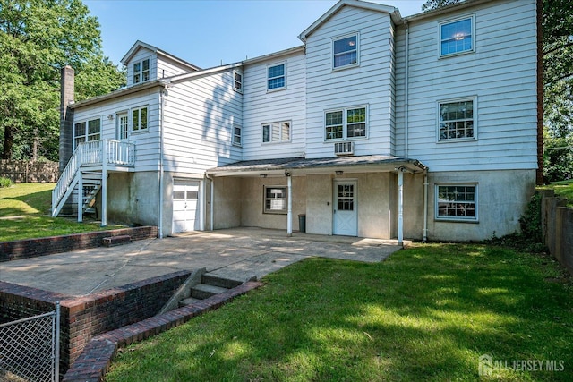 730 Old Post Rd, Edison, NJ 08817 - rear view of property featuring a garage, a chimney, driveway, and a patio area