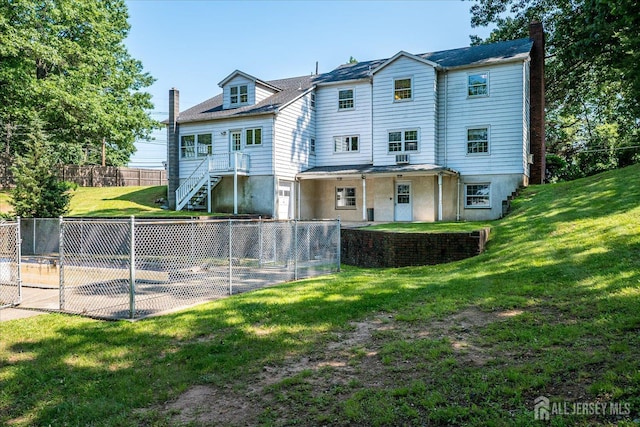 730 Old Post Rd, Edison, NJ 08817 - rear view of house featuring a chimney, a patio, and a fenced backyard