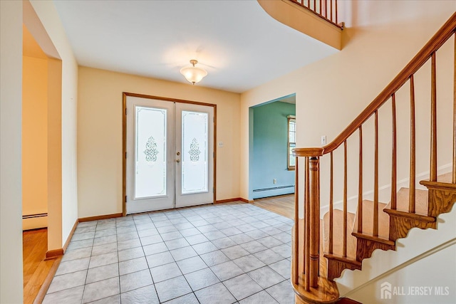 730 Old Post Rd, Edison, NJ 08817 - foyer entrance with a baseboard radiator, stairs, french doors, and light tile patterned flooring