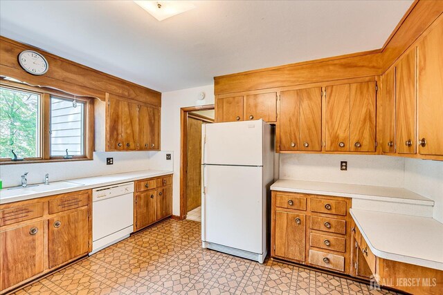 730 Old Post Rd, Edison, NJ 08817 - kitchen featuring white appliances, light countertops, and brown cabinets