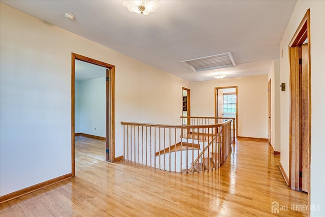 730 Old Post Rd, Edison, NJ 08817 - hallway with an upstairs landing and light wood finished floors