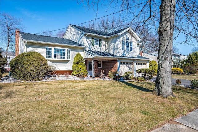 traditional-style house featuring a front lawn, an attached garage, brick siding, and a chimney