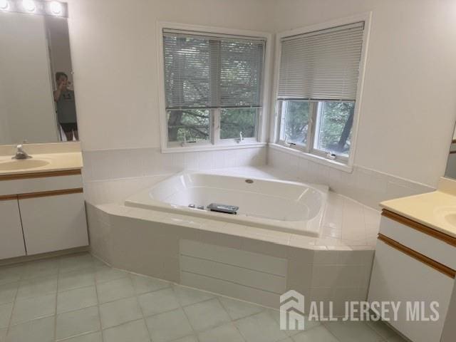 1 Cranberry Ct, South Brunswick, NJ 08540 - full bath featuring two vanities, a bath, and tile patterned flooring
