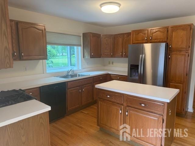 1 Cranberry Ct, South Brunswick, NJ 08540 - kitchen featuring stainless steel fridge with ice dispenser, black dishwasher, light wood finished floors, light countertops, and brown cabinetry