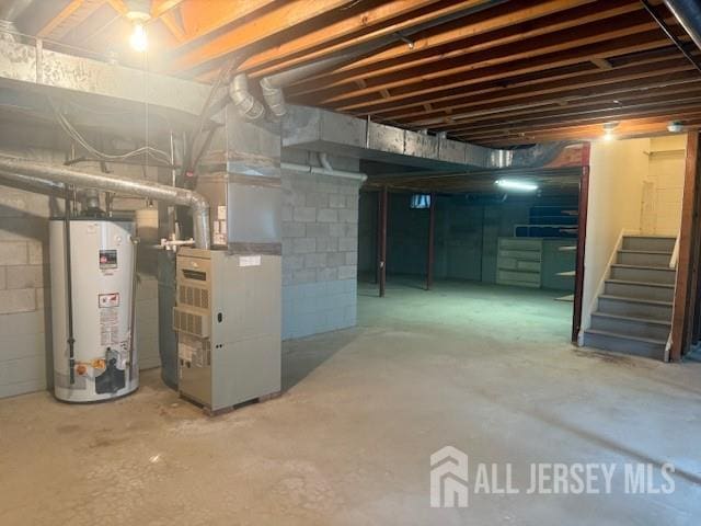 1 Cranberry Ct, South Brunswick, NJ 08540 - unfinished basement featuring water heater, heating unit, and stairs