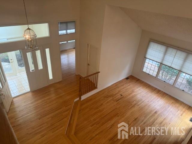 1 Cranberry Ct, South Brunswick, NJ 08540 - foyer entrance featuring a chandelier and wood finished floors