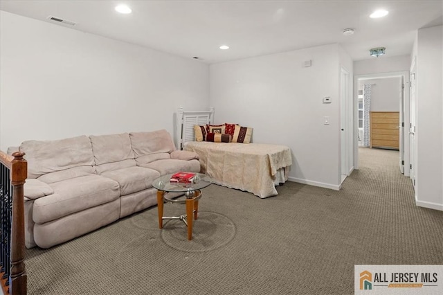 living room with carpet, visible vents, baseboards, and recessed lighting