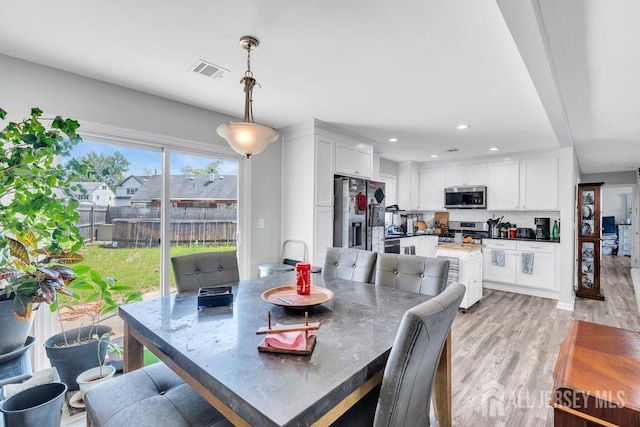 33 Altamont Rd, Edison, NJ 08817 - dining space featuring light wood finished floors and recessed lighting