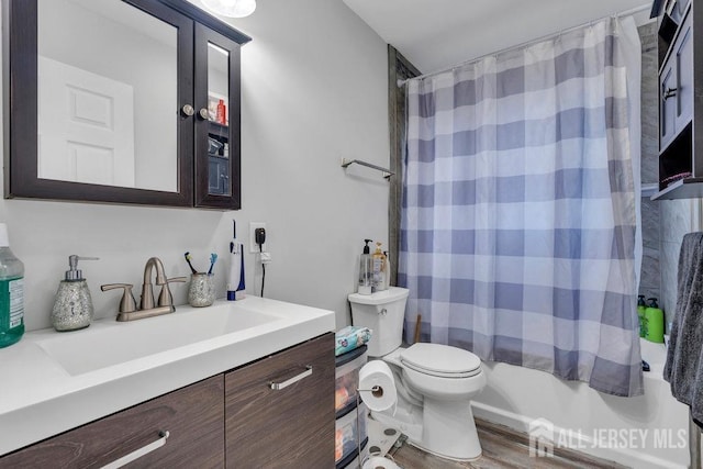 33 Altamont Rd, Edison, NJ 08817 - full bath featuring vanity, toilet, wood finished floors, and shower / bathtub combination with curtain