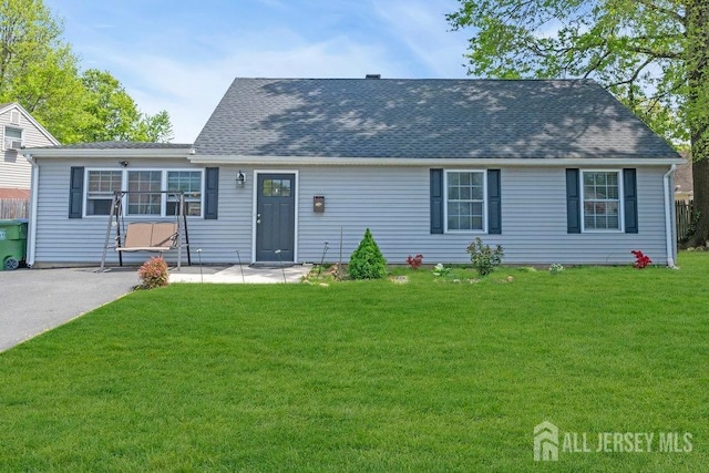 33 Altamont Rd, Edison, NJ 08817 - view of front of house featuring a front yard, a patio, and a shingled roof