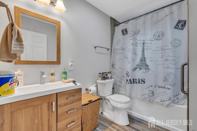 33 Altamont Rd, Edison, NJ 08817 - bathroom featuring vanity, toilet, wood finished floors, and shower / tub combo
