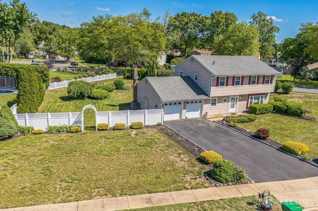 2 Jayne St, Old Bridge, NJ 08857 - view of front of property featuring a garage and asphalt driveway