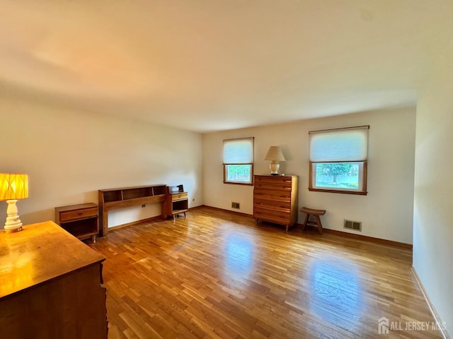 2 Jayne St, Old Bridge, NJ 08857 - living room featuring wood finished floors and baseboards
