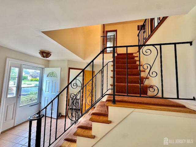2 Jayne St, Old Bridge, NJ 08857 - stairs featuring tile patterned flooring and baseboards