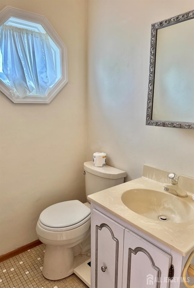 2 Jayne St, Old Bridge, NJ 08857 - bathroom featuring toilet, vanity, baseboards, and tile patterned floors