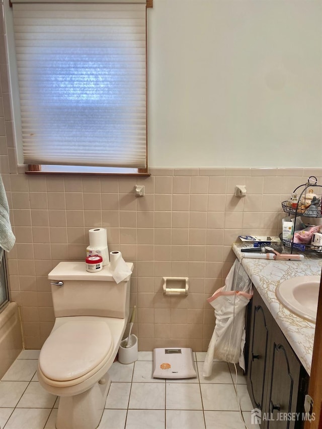 2 Jayne St, Old Bridge, NJ 08857 - bathroom featuring tile walls, tile patterned flooring, toilet, vanity, and a shower