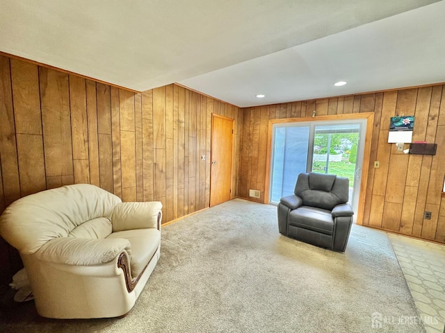 2 Jayne St, Old Bridge, NJ 08857 - living area with wood walls and carpet flooring