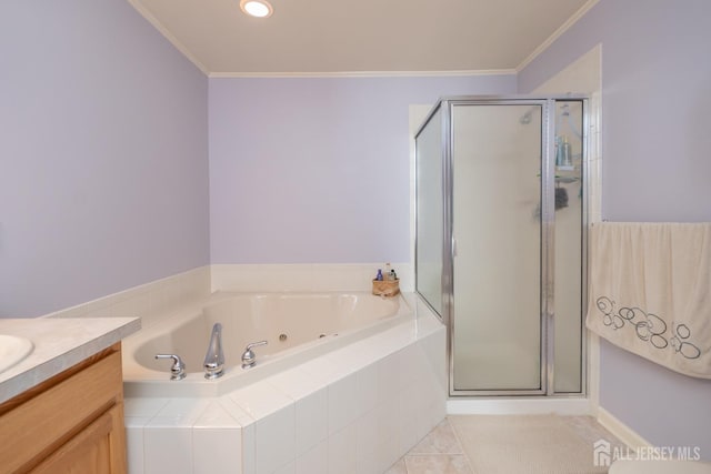 bathroom with independent shower and bath, tile patterned flooring, vanity, and ornamental molding