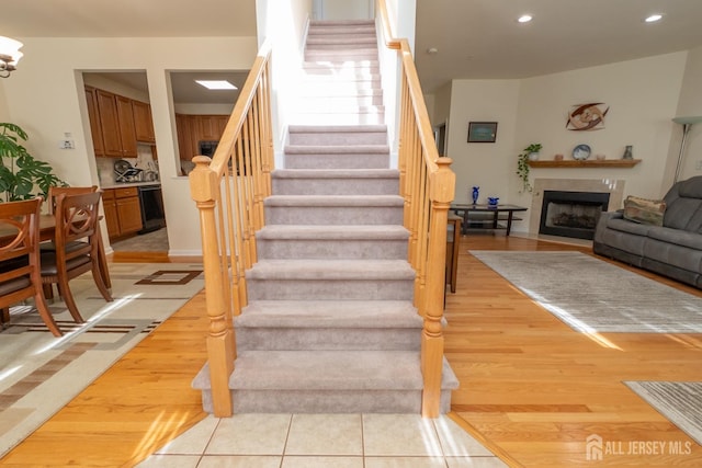 stairway featuring hardwood / wood-style flooring