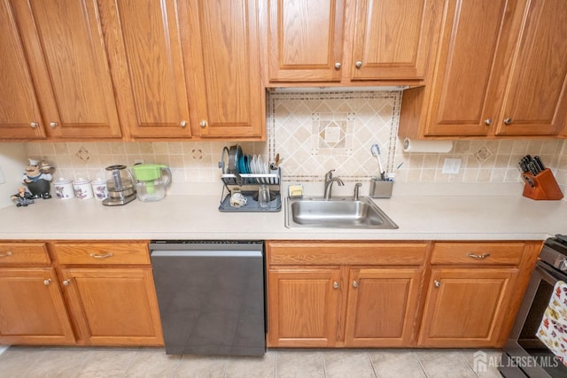 kitchen featuring stainless steel dishwasher, black electric range oven, sink, and backsplash