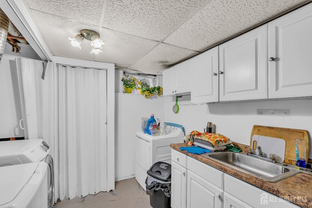 laundry room featuring sink and independent washer and dryer